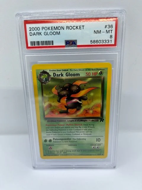 Dark Gloom 36/82 PSA 8 Graded Rare Pokemon Card (2000 Pokemon Rocket)