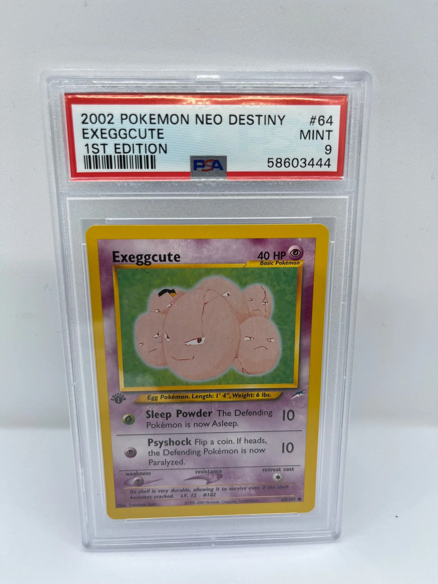 Exeggcute 64/105 PSA 9 Graded Common Pokemon Card (2002 Pokemon Neo Destiny)