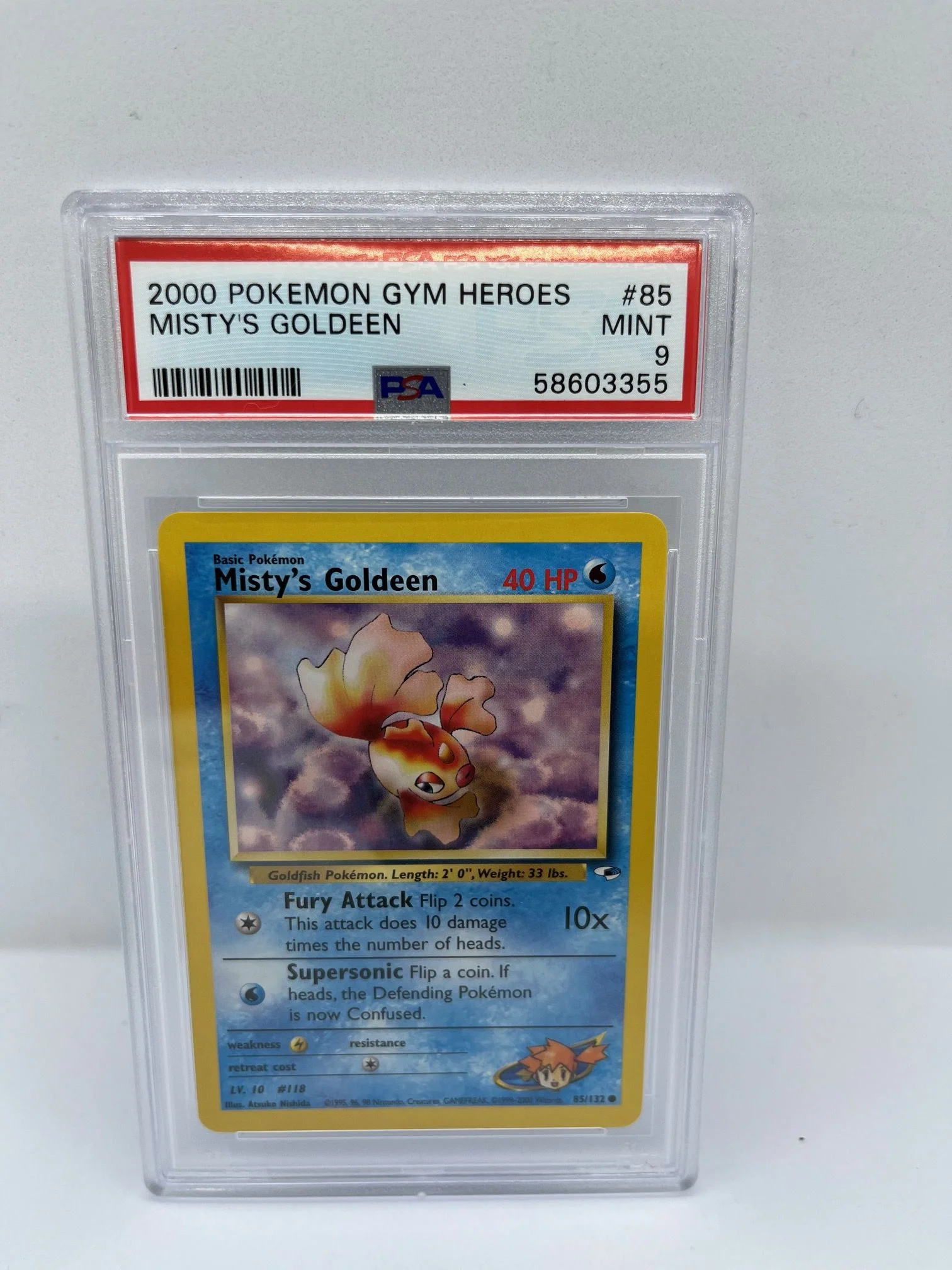 Mistys Goldeen 85/132 PSA 9 Graded Common Pokemon Card (Pokemon Gym Heroes)
